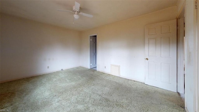 unfurnished bedroom with light colored carpet and ceiling fan