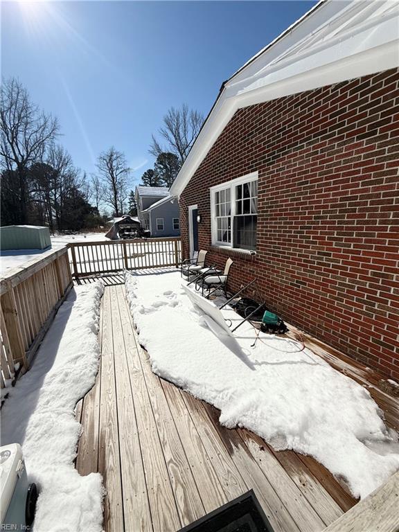 view of snow covered deck