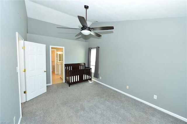 bedroom with light carpet, ceiling fan, and baseboards