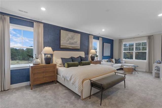 bedroom featuring light carpet, recessed lighting, baseboards, and ornamental molding