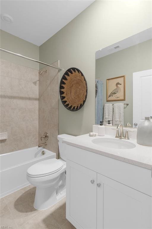 full bathroom featuring  shower combination, vanity, toilet, and tile patterned floors