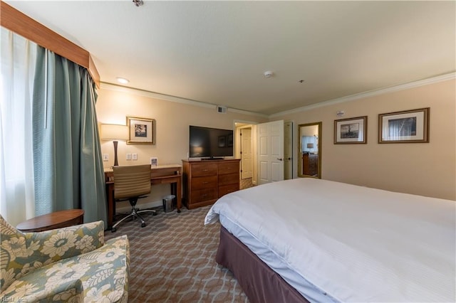 bedroom with baseboards, dark colored carpet, visible vents, and crown molding