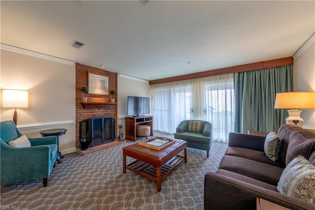 living area with visible vents, baseboards, ornamental molding, carpet floors, and a brick fireplace