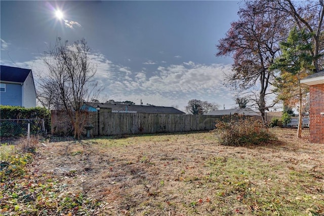 view of yard with fence