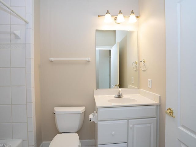 full bath featuring toilet, walk in shower, and vanity