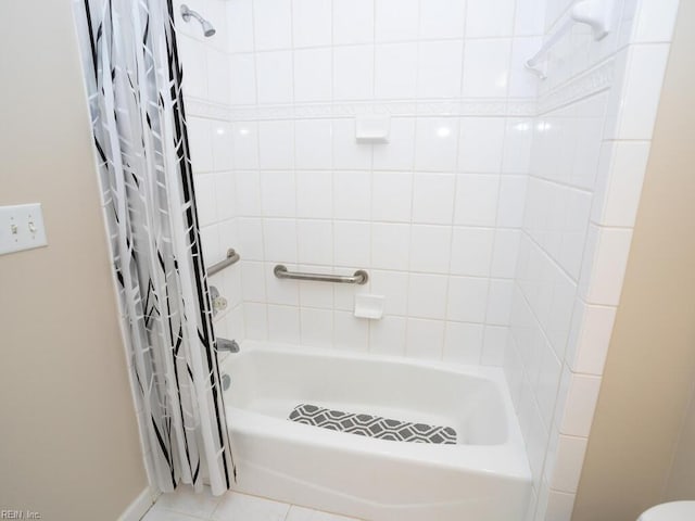 bathroom featuring shower / tub combo with curtain and tile patterned floors