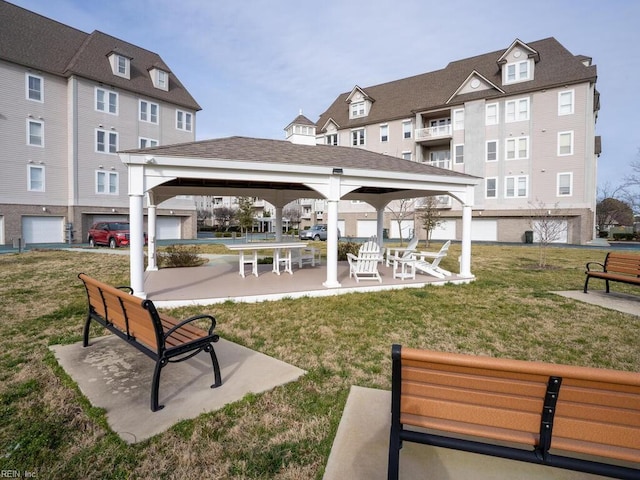 surrounding community featuring a yard and a gazebo