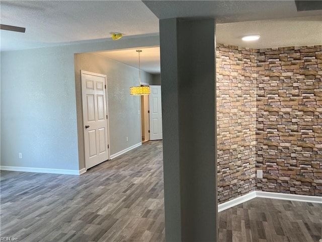 211 Central Ave, Suffolk, VA 23434 - empty room with a textured ceiling, baseboards, and dark wood-type flooring