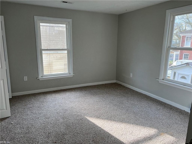 211 Central Ave, Suffolk, VA 23434 - carpeted spare room featuring visible vents and baseboards