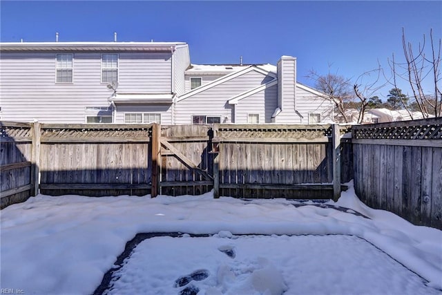 exterior space with a gate and fence