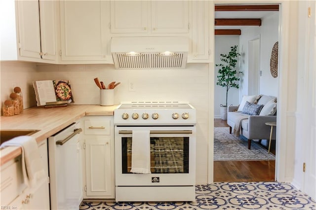 kitchen with white appliances, white cabinets, custom exhaust hood, light countertops, and beam ceiling