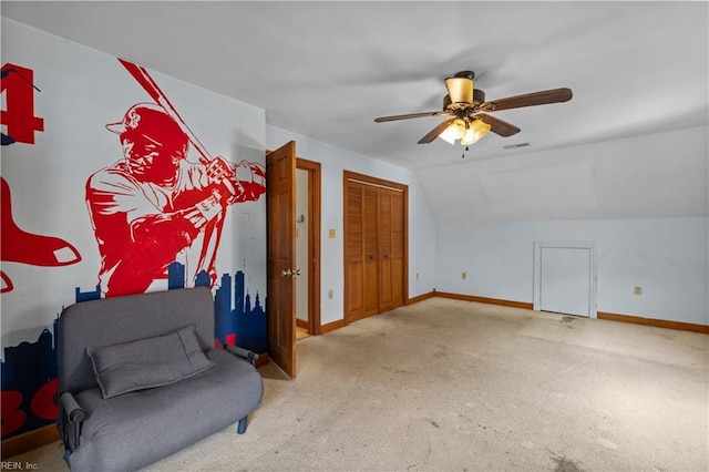 additional living space with carpet, visible vents, vaulted ceiling, ceiling fan, and baseboards