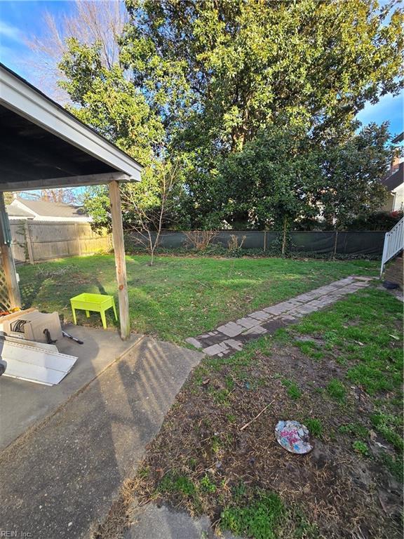 view of yard with a patio and a fenced backyard