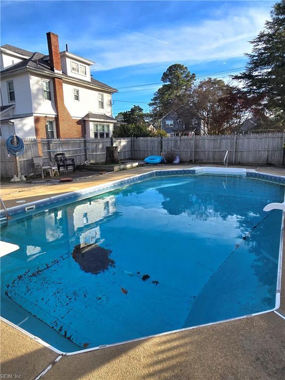 view of pool featuring fence and a fenced in pool