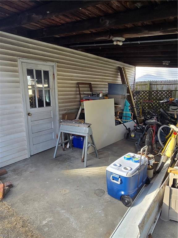 view of patio featuring fence