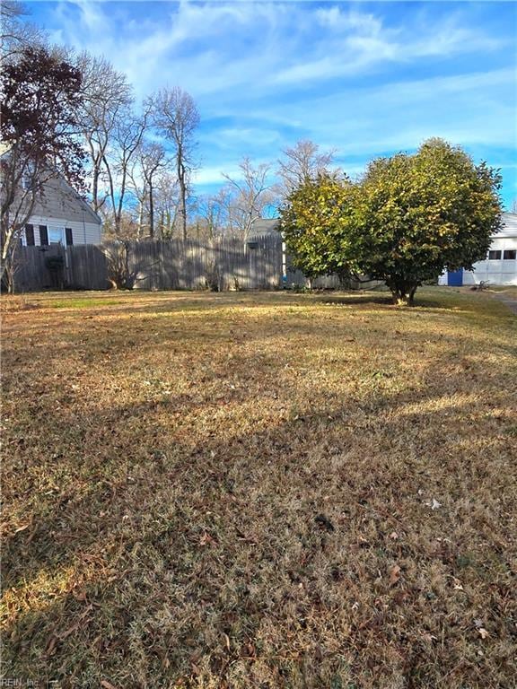 view of yard featuring fence