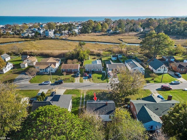 aerial view with a water view and a residential view