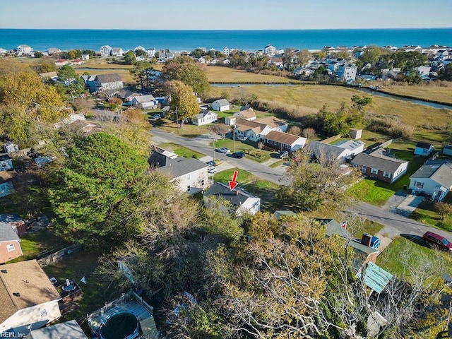 bird's eye view with a residential view and a water view