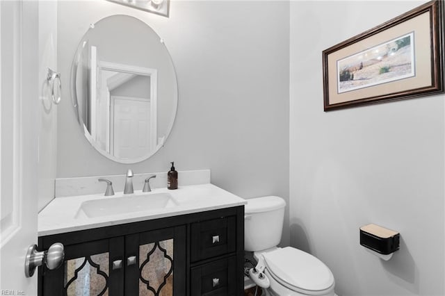 half bath with toilet and vanity