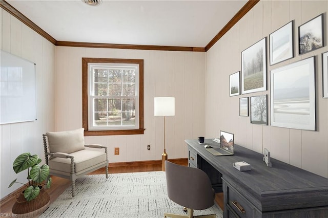 home office with ornamental molding and light wood-type flooring