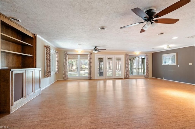 unfurnished living room with a healthy amount of sunlight, crown molding, and a textured ceiling