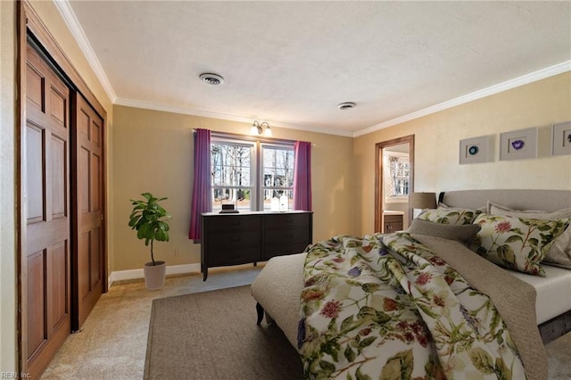 bedroom featuring ornamental molding, light colored carpet, visible vents, and baseboards