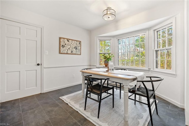 dining space with baseboards