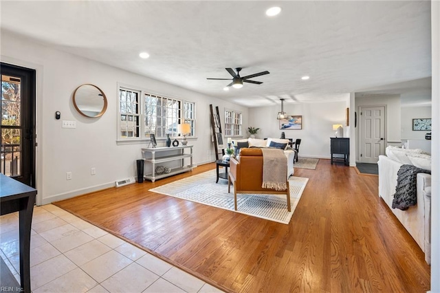 dining space featuring baseboards, recessed lighting, visible vents, and light wood-style floors