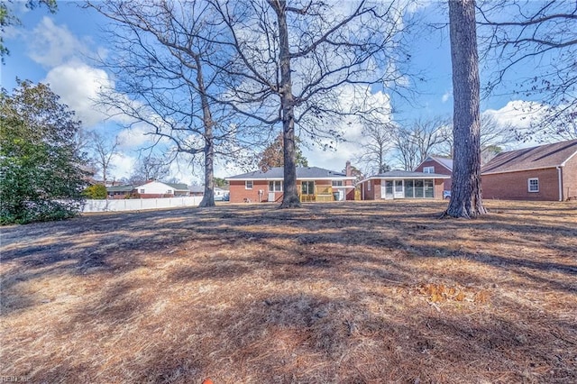 view of yard featuring fence