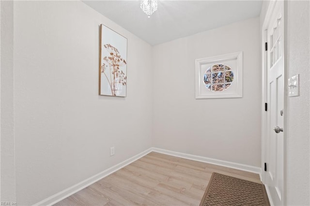 interior space with light wood-type flooring and baseboards