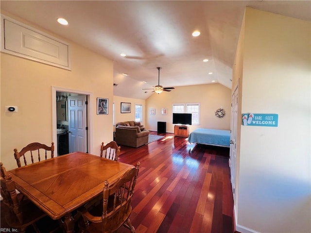 dining area with vaulted ceiling, ceiling fan, dark wood-type flooring, and recessed lighting