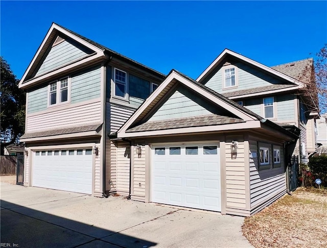 view of front of house featuring a garage and concrete driveway