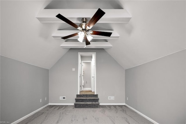 bonus room with lofted ceiling, a ceiling fan, light colored carpet, and baseboards