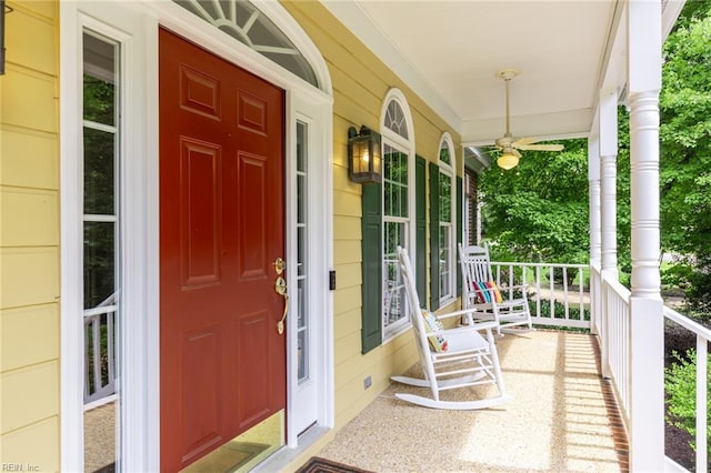 view of exterior entry with covered porch