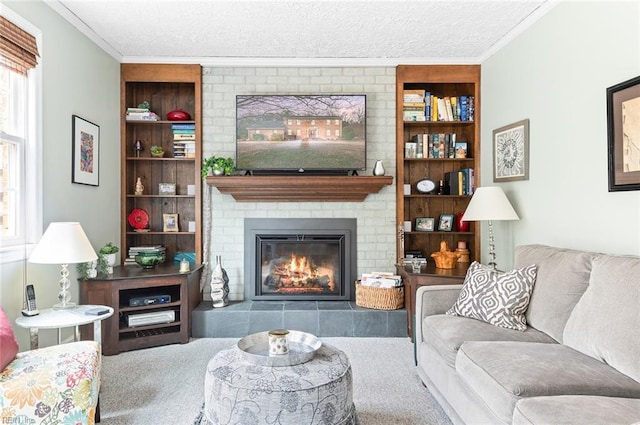 carpeted living room featuring a textured ceiling, ornamental molding, and a brick fireplace