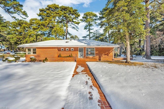 view of front of property featuring brick siding