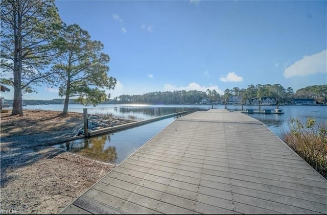 view of dock with a water view