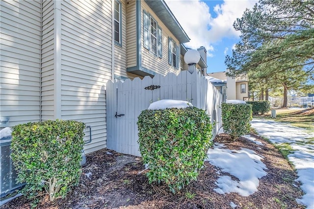 view of side of property with fence