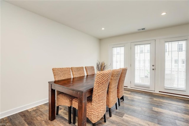 dining area with baseboards, visible vents, dark wood-style floors, french doors, and recessed lighting