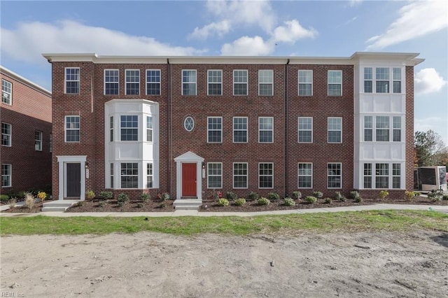 view of front facade with brick siding