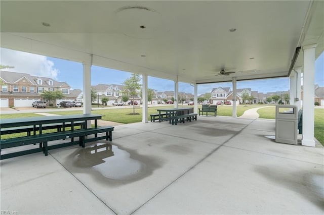 view of patio featuring a residential view and ceiling fan