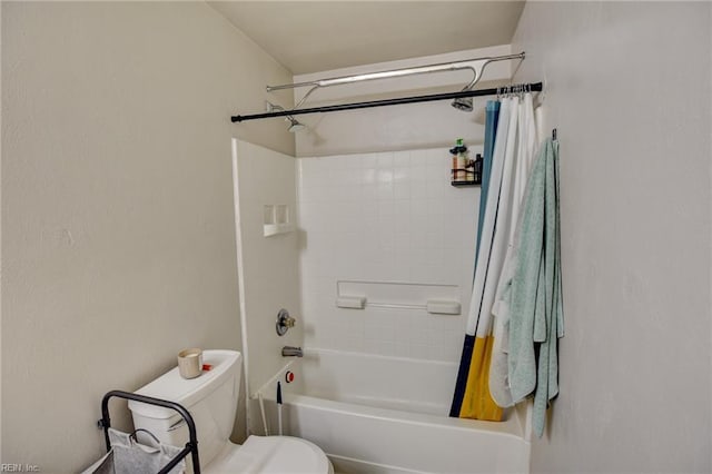 full bathroom featuring toilet and shower / tub combo with curtain