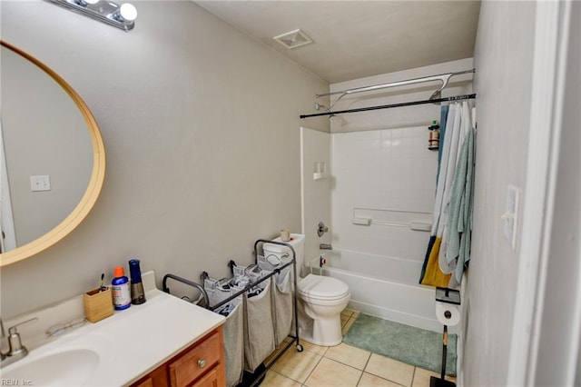 bathroom featuring visible vents, toilet, tile patterned floors, shower / bath combo with shower curtain, and vanity