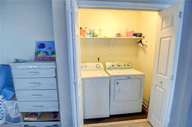 laundry room with laundry area and washer and clothes dryer