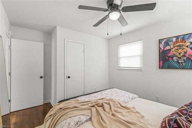 bedroom featuring ceiling fan and wood finished floors