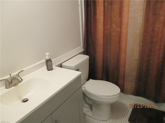 full bath featuring a shower with curtain, vanity, toilet, and tile patterned floors