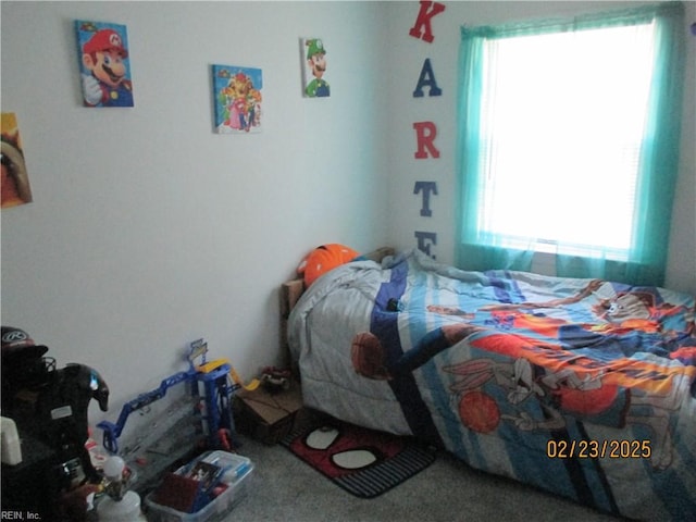 bedroom featuring carpet flooring