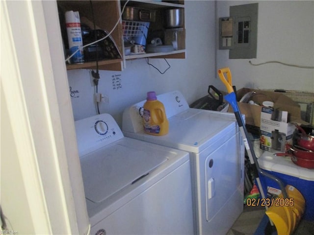 laundry room with laundry area, electric panel, and independent washer and dryer