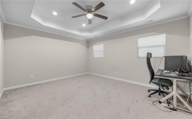 office with crown molding, recessed lighting, a raised ceiling, light colored carpet, and baseboards