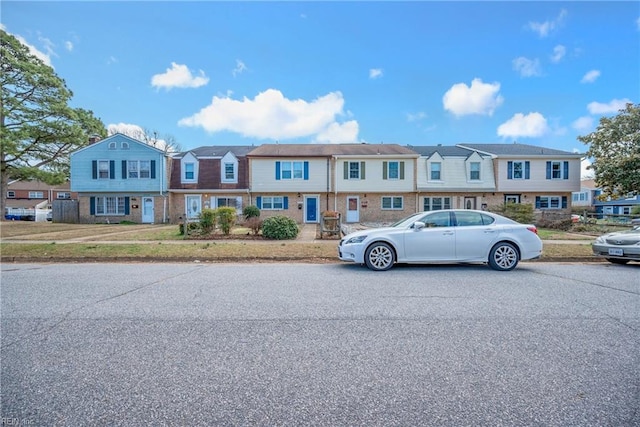 view of property with a residential view